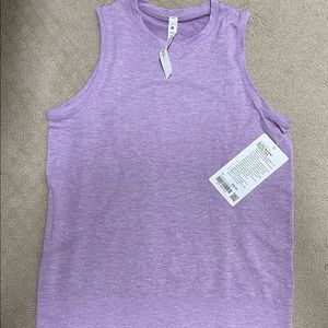NWT Lululemon 
SWIFTLY BREATHE MUSCLE TANK TOP
Wisteria Purple/White, size 4